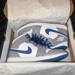 Jordan 1 Mid men’s shoes. Size 9.5, worn twice and have been kept in box since.